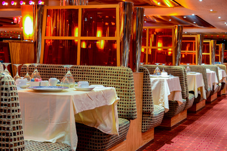 Interior restaurant cruise ship with table, plate and glassesのeditorial素材