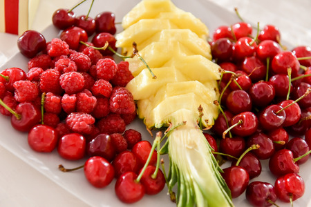 Cherry, raspberry, pineapple plateauの写真素材