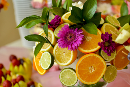 Arrangements with orange fruit in natural lightの写真素材