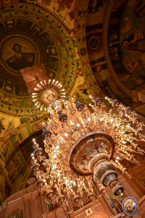 Floor lamp in the church in natural lightの写真素材