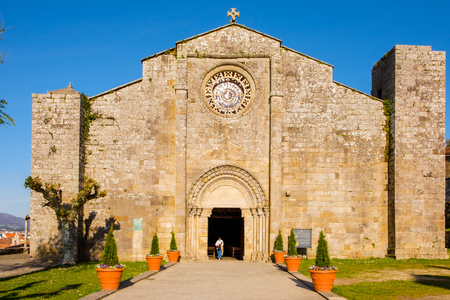 Baiona, Espanha - May 03, 2018 : Person leaving the church of Santa Maria, Pontevedra, Espanhaのeditorial素材