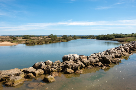 S. Martinho do Porto, Portugal - September 21, 2018 : Entrance of the river Salir do Porto in the bay of S. Martinho do Porto Alcobaca, Portugalのeditorial素材