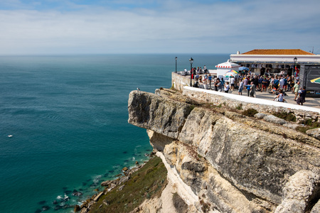 Nazare, Portugal - September 20, 2018 : People on the top of the cliff in Nazare from above Nazare, Portugalのeditorial素材