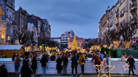 Braga, Portugal - December 23, 2018: In the holiday season the streets of the city fill with people....