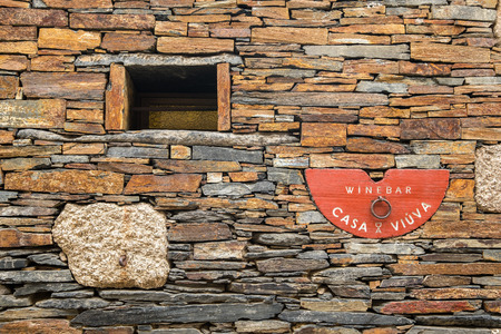 Penafiel, Portugal - September 29, 2019: Quintandona, a Portuguese village of singular architecture and its buildings in slate, granite and slate stone. Penafiel, Portugal.のeditorial素材