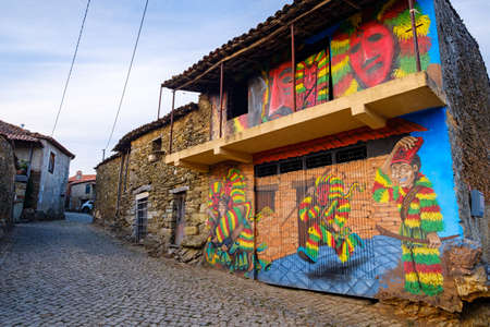 Macedo de Cavaleiros, Portugal - August 28, 2021 : Intangible Cultural Heritage of Humanity by UNESCO. Murals in the streets of Podence. Braganca District, Portugalのeditorial素材