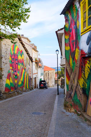 Macedo de Cavaleiros, Portugal - August 28, 2021 : Intangible Cultural Heritage of Humanity by UNESCO. Murals in the streets of Podence. Braganca District, Portugalのeditorial素材