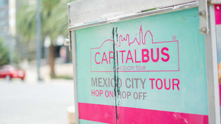 Bus and Mexico City Tour Advertisement on a Mexican Phone Booth