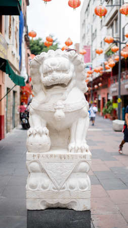 Stone Statue of a Chinese Dragon in Chinatownの写真素材