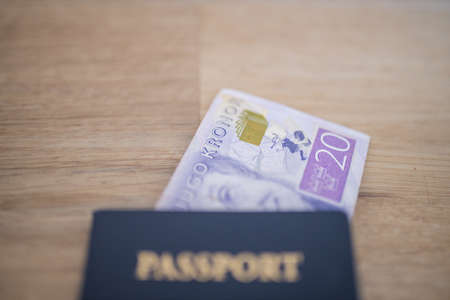 Twenty Swedish Kronor Banknote Inside a United States of America Passportの写真素材