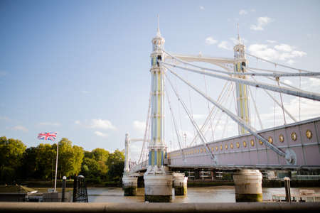 Landscape View of the Albert Bridge Over the River Thames and Under a Blue Skyのeditorial素材
