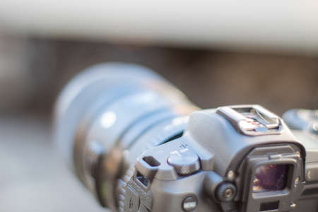 Camera on tripod up-close recording the blurry streetの写真素材