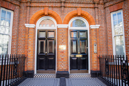 British duplex house with arches above the doors