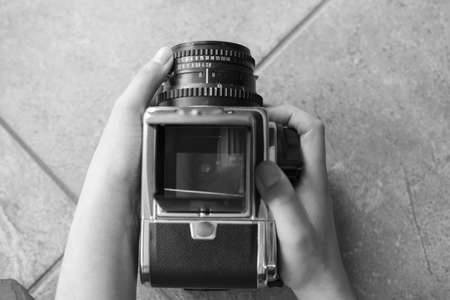 taking pictures with a vintage medium format cameraの写真素材