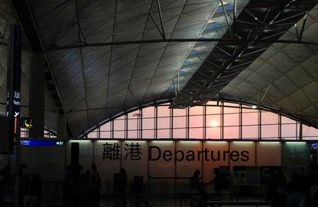 Hong Kong Airport Departures and romantic sunの写真素材