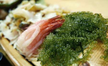 Japanese food seaweed salad and raw shrimp sashimiの写真素材