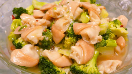 Meal of Seafood clam and broccoli on the transparent dishの写真素材