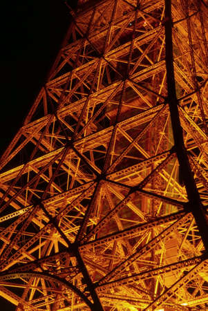 A part of Japan Tokyo Tower building with orange lamps at night timeのeditorial素材
