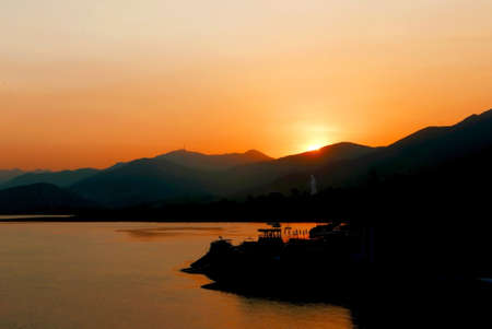 mountain and sea landscape in the golden sunset
