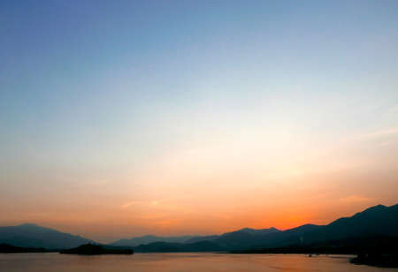 mountain and sea landscape in the gradient sunsetの写真素材