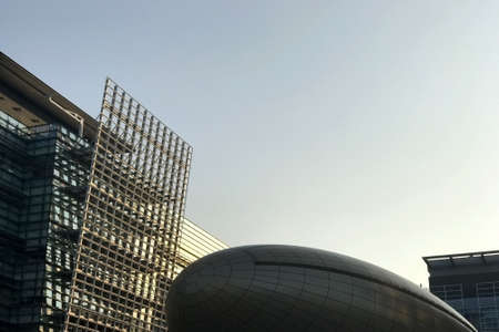 modern commercial office building and the blue skyの写真素材