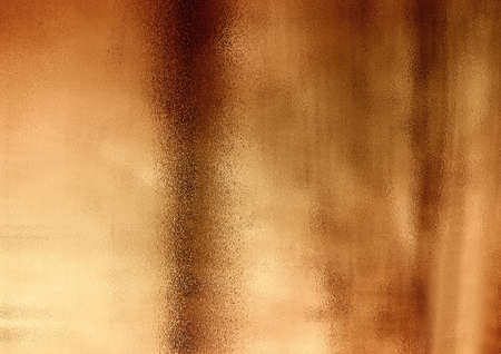 The bronze shinny abstract copper textured backgroundの写真素材