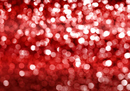 The Christmas red bokeh glittering bright abstract backgroundの写真素材