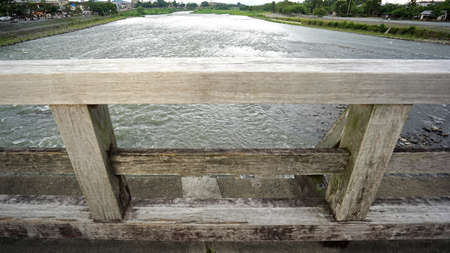 The wooden bridge, rapid river in countryside of Japan Kyotoのeditorial素材
