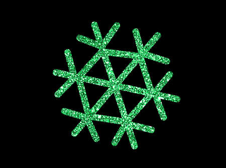 Glitter green Christmas decoration snowflake on black backgroundの写真素材