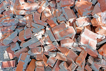 The ruined red bricks on the road from top view