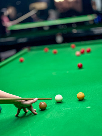 Playing snooker balls on the green game table closeupの写真素材