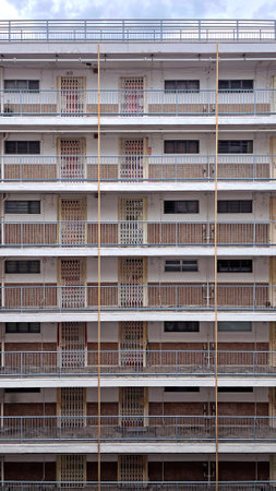 The Hong Kong housing problem old appartment estate building in downtown with sky