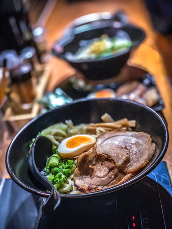 The vertical Tsukemen noodles with meat and egg in Japanese restaurantの写真素材
