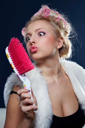 Ready to be beautiful - young lady working on her beauty, make up and hairstyle preparing for party.の写真素材