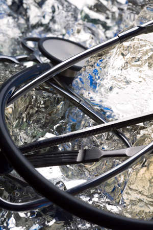 Medical instruments on ice - frozen steel and health careの写真素材