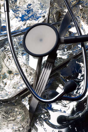 Medical instruments on ice - frozen steel and health careの写真素材