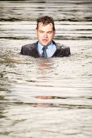 Crazy businessman after psychic collapseの写真素材