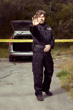 Do not go there! Abandoned car under police controlの写真素材