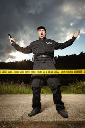 Police man angry on place of crimeの写真素材