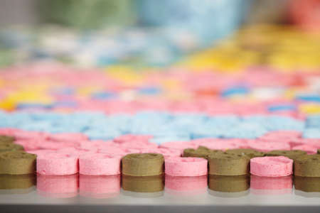Detail of pills of MDMA (Extasy) distributed by drug dealer seized by legal authorityの写真素材