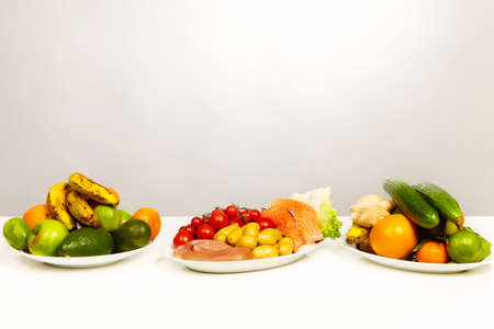 Healthy food menu good for fitness on platesの写真素材