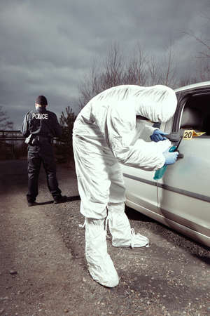 Crime scene investigation - developing of latent fingerprint on carの写真素材