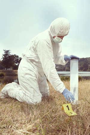 Crime scene investigation - working with evidence on place of crimeの写真素材