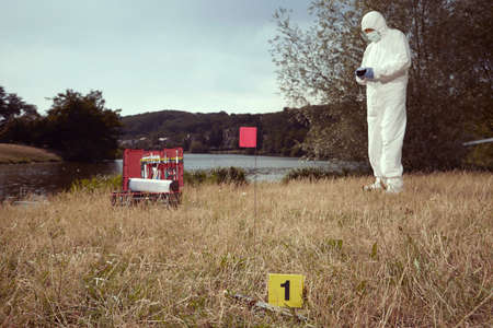 Crime scene investigation - working with evidence on place of crimeの写真素材