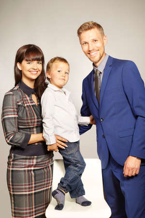 Young cute married couple with three years old sonの写真素材