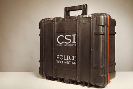 Suitcase of criminologist technician for use on crime scene