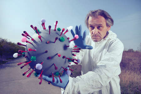 Man in protective suit with no mask operating with coronavirus