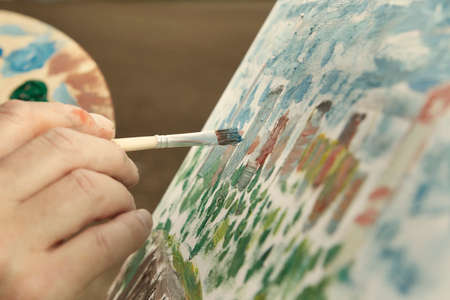 Detail of  painting artwork on canvas in sunny day fieldの写真素材