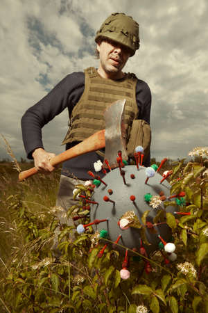 Man in style of territorial army catching virion of coronavirus