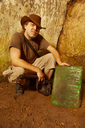 Adventurer in ancient cave finally found mysterious artifact emerald tablet